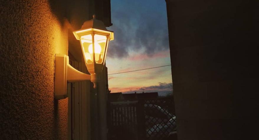 An outside wall light installed in Corsham. This style light is a lantern and didn't have a PIR.