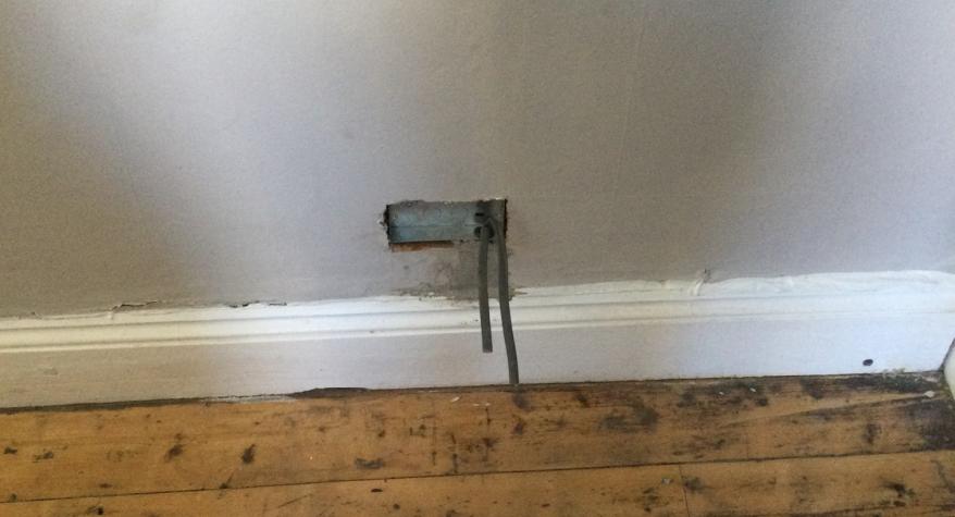 Installation of a new double socket next to a bed by an electrician in Bath